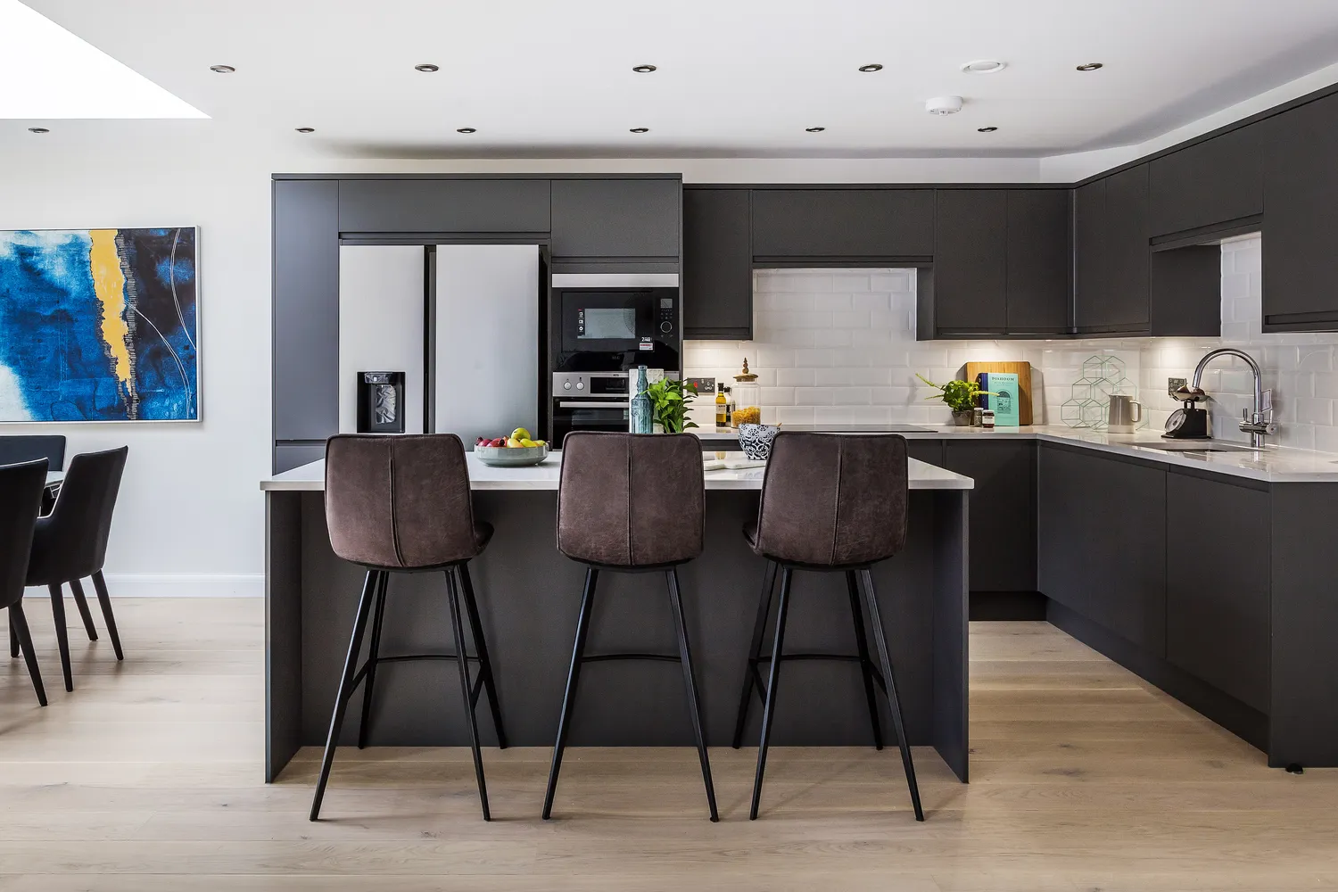 A dark architectural kitchen at a premium Tunbridge Wells home, shot by Bagshaw & Hardy.